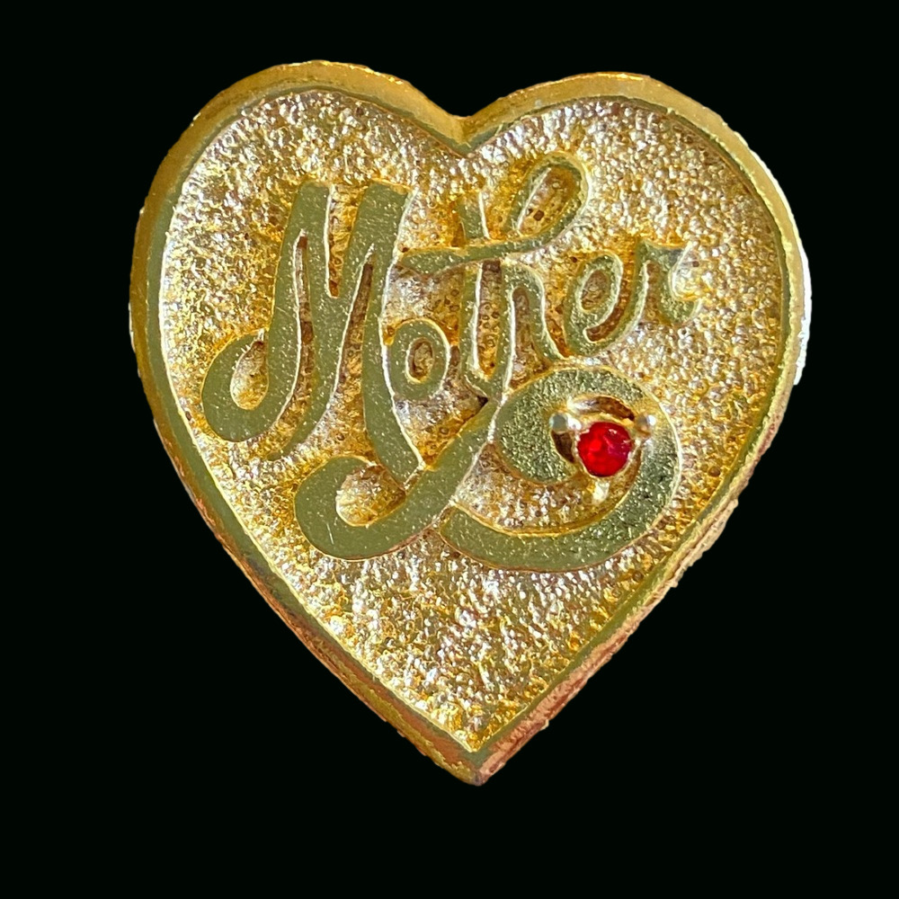 Gerry’s signed Mother heart brooch pin in goldtone with red rhinestone accent